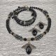 Komplet biżuterii naszyjnik-choker z posrebrzaną zawieszką z kamieni szlachetnych (czarny agat),bransoletką na drucie pamięciowym i kolczyki