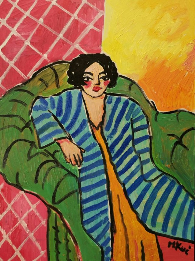 obraz do salonu portret kobieta na kanapie