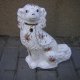 ogromny 32 cm wysokości porcelanowy pies sygnowany, bogato zdobiony