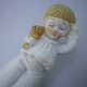 statej daty Porcelanowa figurka dzwonek