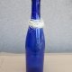 Niebieska butelka z fajnym korkiem