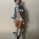 Porcelanowa figurka dawnej daty ręcznie malowana 21,5 cm