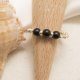 Minimalistyczny elastyczny pierścionek na gumce z kamieniem naturalnym Black Stone.