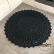 Okrągły dywan ze sznurka o średnicy 130 cm.