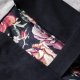 Czarny plecak kurierski damski w kwiaty