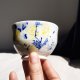 Porcelanowa czarka do herbaty. Ręcznie malowana w japońskim stylu. Impresja - kaczeńce.