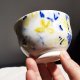 Porcelanowa czarka do herbaty. Ręcznie malowana w japońskim stylu. Impresja - kaczeńce.