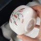 Czarka porcelanowa z dziką różą.
