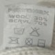 Czapka kremowa zimowa warkocze Pawonex 30 % wełna