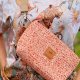 Holly torebko nerka z plecionki Brzoskwiniowa