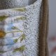 Beżowy workoplecak z plecionki z kieszeniami patchwork
