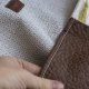 Beżowy workoplecak z plecionki z kieszeniami patchwork