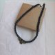 Czarny choker z ptakiem