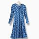An amazing vintage boho dress with puff sleeves and classic white polka dots