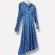 An amazing vintage boho dress with puff sleeves and classic white polka dots