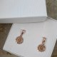 kolczyki AMULETY- różowe złoto 18K