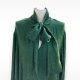 A stunning vintage ribbon 100% viscose dress in a deep, bottle-green hue
