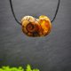 Wisiorek "Bursztynowy ślimak" –żywioł ognia i bursztynowego światła,octowiec, pirografia, prezent; Amber and Wood Pendant, biżuteria