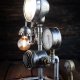 Industrialna lampa loftowa ze starych manometrów,  reflektora i telefonu