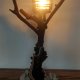Lampa z gałęzi i kamienia – naturalne światło, ręczna robota