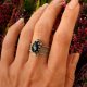 Obrączka srebrna z ciemnym labradorytem regulowana