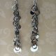 Długie, srebrne kolczyki z błyszczącymi kółkami