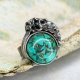 Pierścień z turkusem w srebrnych kwiatach “Naturalna harmonia" a1117