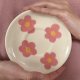 Filiżanka z talerzykiem - kwiaty
