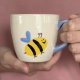 Filiżanka z talerzykiem - pszczółki