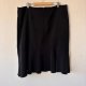 Czarna, elegancka spódnica o kobiecym kroju z delikatnym rozkloszowaniem u dołu LOOK Rozmiar XL / 42 / 14