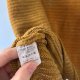 Musztardowy sweter oversize z błyszczącą nitką 5XL / 50 / 22·Bardzo dobry