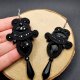 Błyszczące czarne kolczyki sutasz