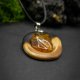 Naszyjnik "Magia Bursztynu" – żywioł ognia i bursztynowego światła, octowiec, pirografia, Amber and Wood Pendant, biżuteria z drewna