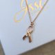 HOPE RIBBON- naszyjnik różowe złoto 18K  symbol walki z rakiem