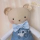 Miś Antoś przytulanka w białym sweterku i niebieskich ogrodniczkach