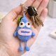 Kolorowy brelok szydełkowy – wesoły stworek handmade