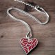 Naszyjnik z wzorem ozdobnego serca wykonany ze stali i drewna