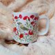 Mysikrólik wśród maków ręcznie malowany kubek 270 ml.