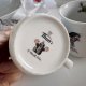 Kubek porcelanowy z Krecikiem w wersji w kosmosie