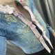 haftowany jeans