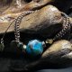Amulet Harmonii: Ręcznie Pleciona Bransoletka z Niebieskim Agatem i Liściem Monstera