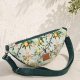 Pikowana torebka nerka crossbody Taormina