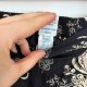 Czarne kluoty w beżowe kwiaty Junona 7XL szerokie nogawki Plus Size 7XL / 54 / 26