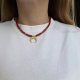 Ceramiczny choker z wisiorkiem w kształcie lunuli