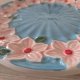 Dwa talerze ceramiczne grubo szkliwione kwiaty