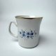 Kubek Włocławek porcelana PRL vintage Niebieskie kwiaty złocenia