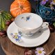 Niemiecka porcelana filiżanka i spodek z kwiatowym motywem