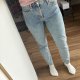 Jasnoniebieskie jeansy wysoki stan z ozdobnymi ćwiekami H&M