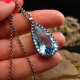 Naszyjnik Amulet Mocy - Topaz Swiss Blue Srebro