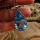Naszyjnik Amulet Mocy - Topaz Swiss Blue Srebro